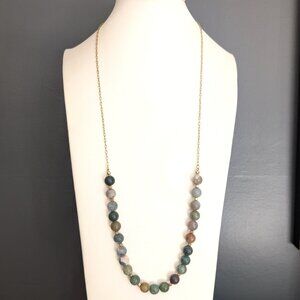Polished, round natural stone beaded necklace on gold chain